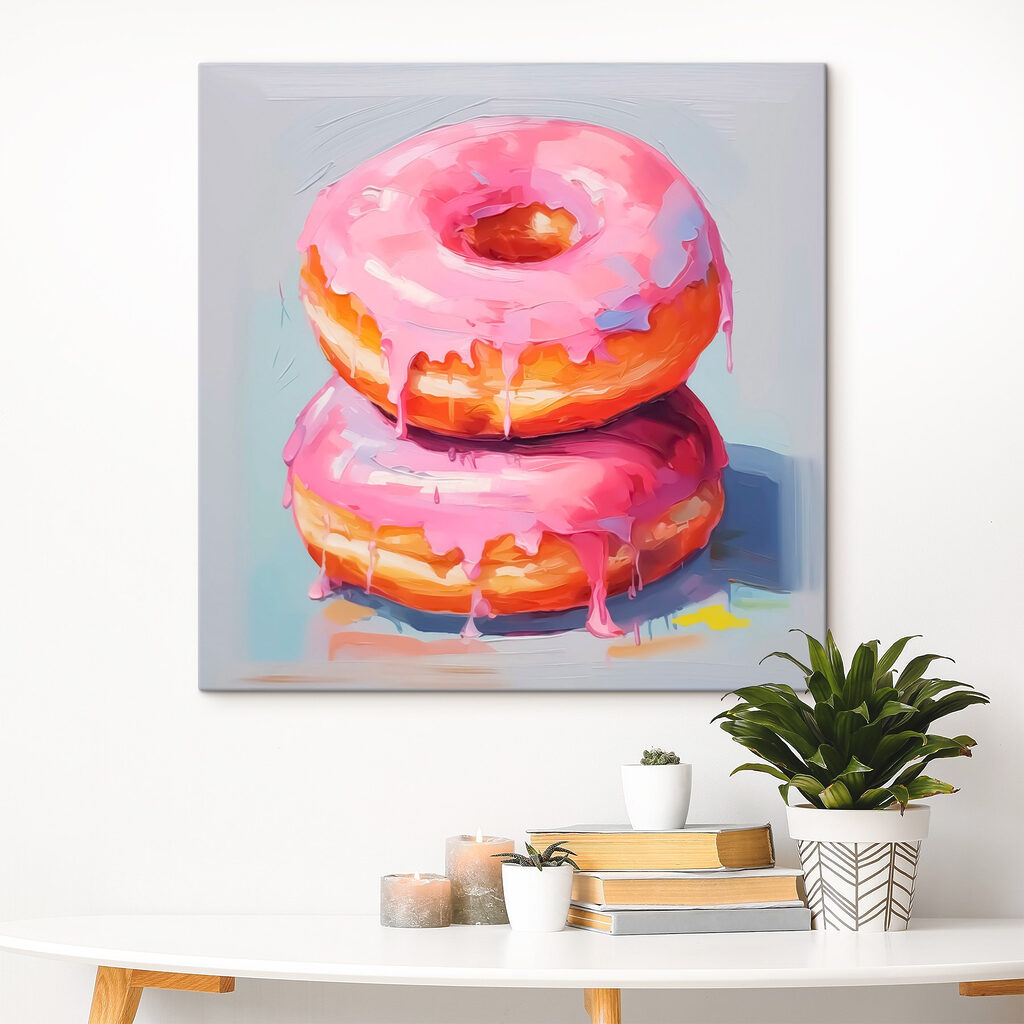 Two donuts with pink frosting