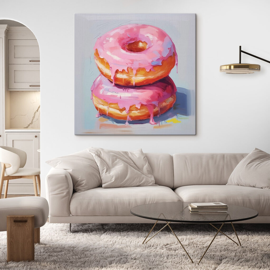 Two donuts with pink frosting