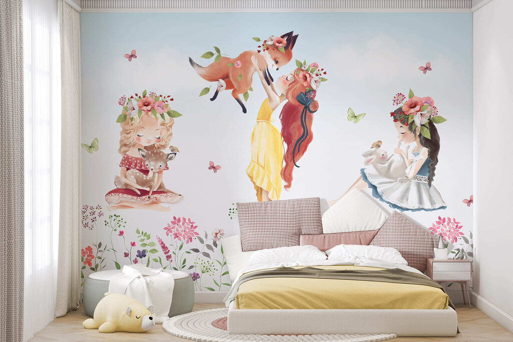 Group of girls holding animals in a field of flowers Group of girls holding animals in a field of flowers