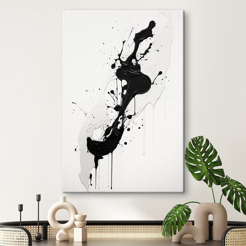 Black and white paint splattered on a white surface Black and white paint splattered on a white surface