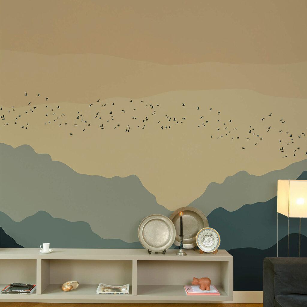 Madárcsoport repül a hegyek felett Madárcsoport repül a hegyek felett