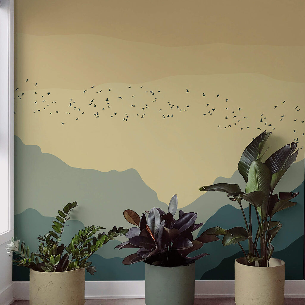 Madárcsoport repül a hegyek felett Madárcsoport repül a hegyek felett