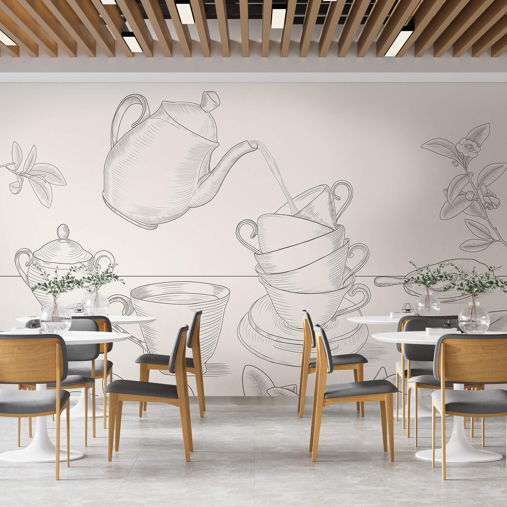 Teáskanna, amely egy teáscsészékből álló halomba önt