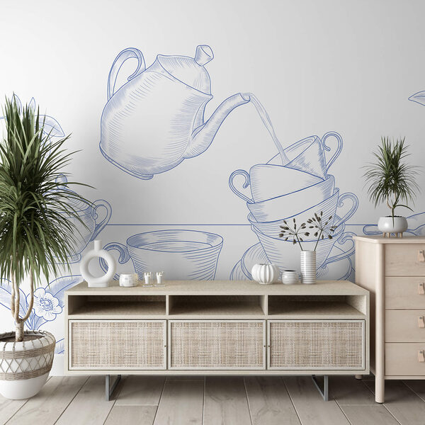 Teáskanna, amely egy teáscsészékből álló halomba önt