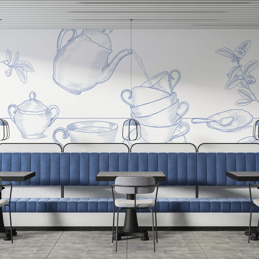 Teáskanna, amely egy teáscsészékből álló halomba önt