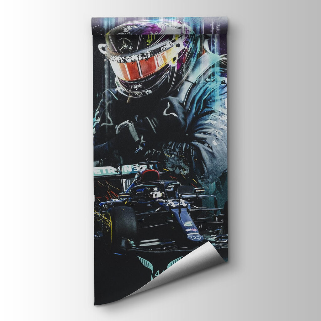 Person wearing a helmet and holding a race car