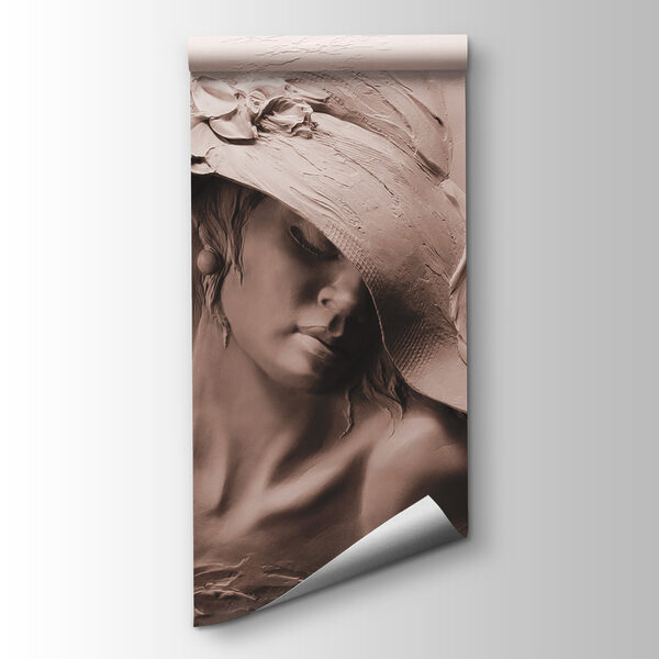 A sculpture of a woman in a hat