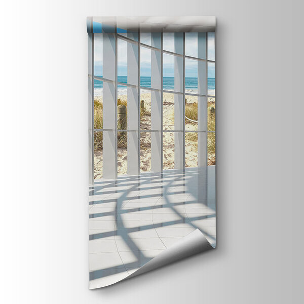 Large room with windows and a beach view