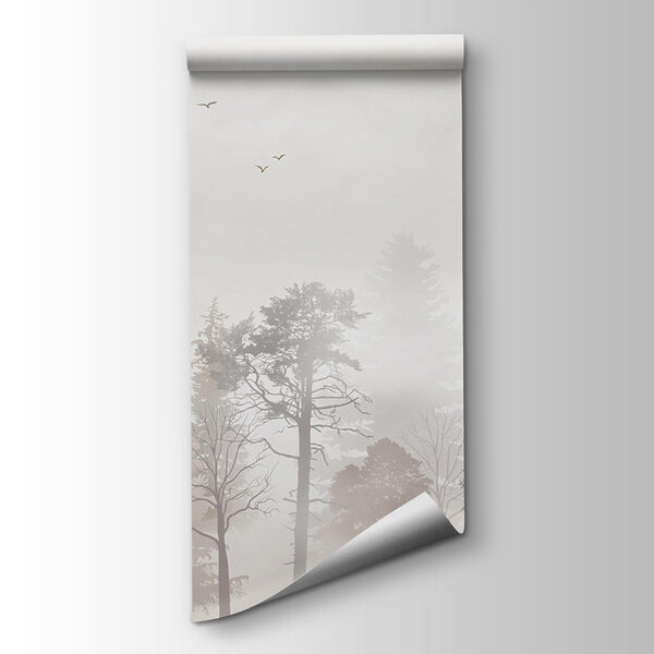 A group of trees in a foggy forest