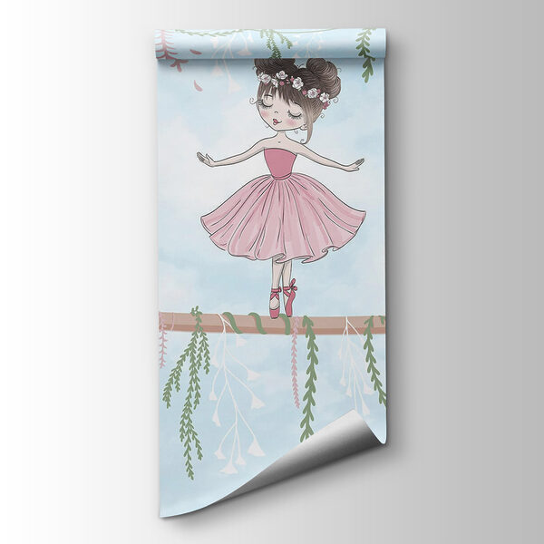 Girl in a pink dress on a branch