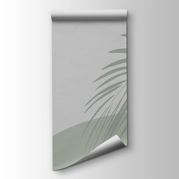 Palm leaves on a grey background