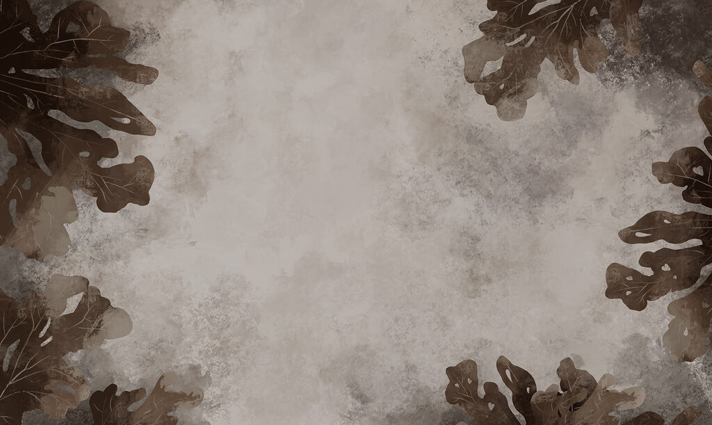 Brown leaves on a white surface