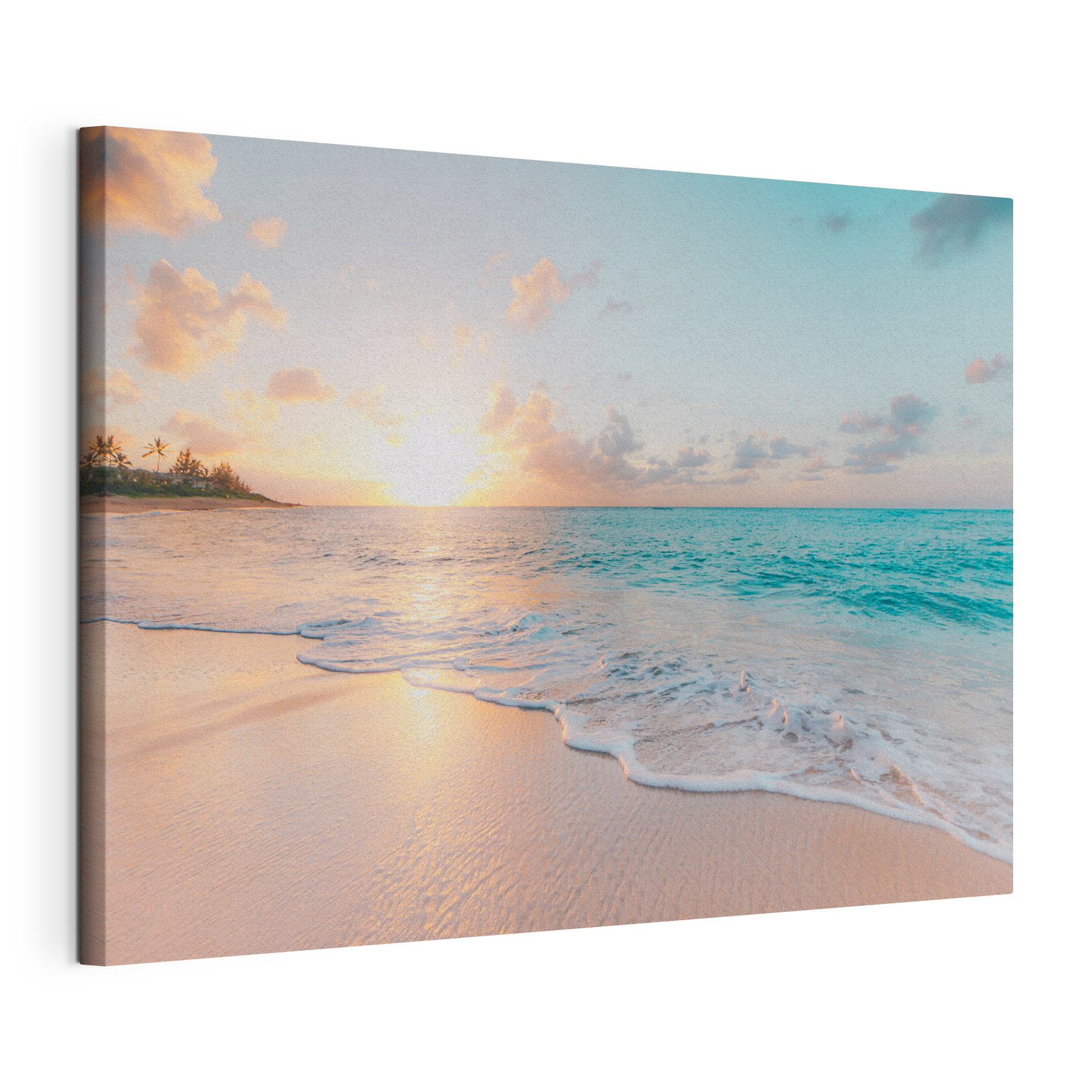 A beach with waves and a sunset