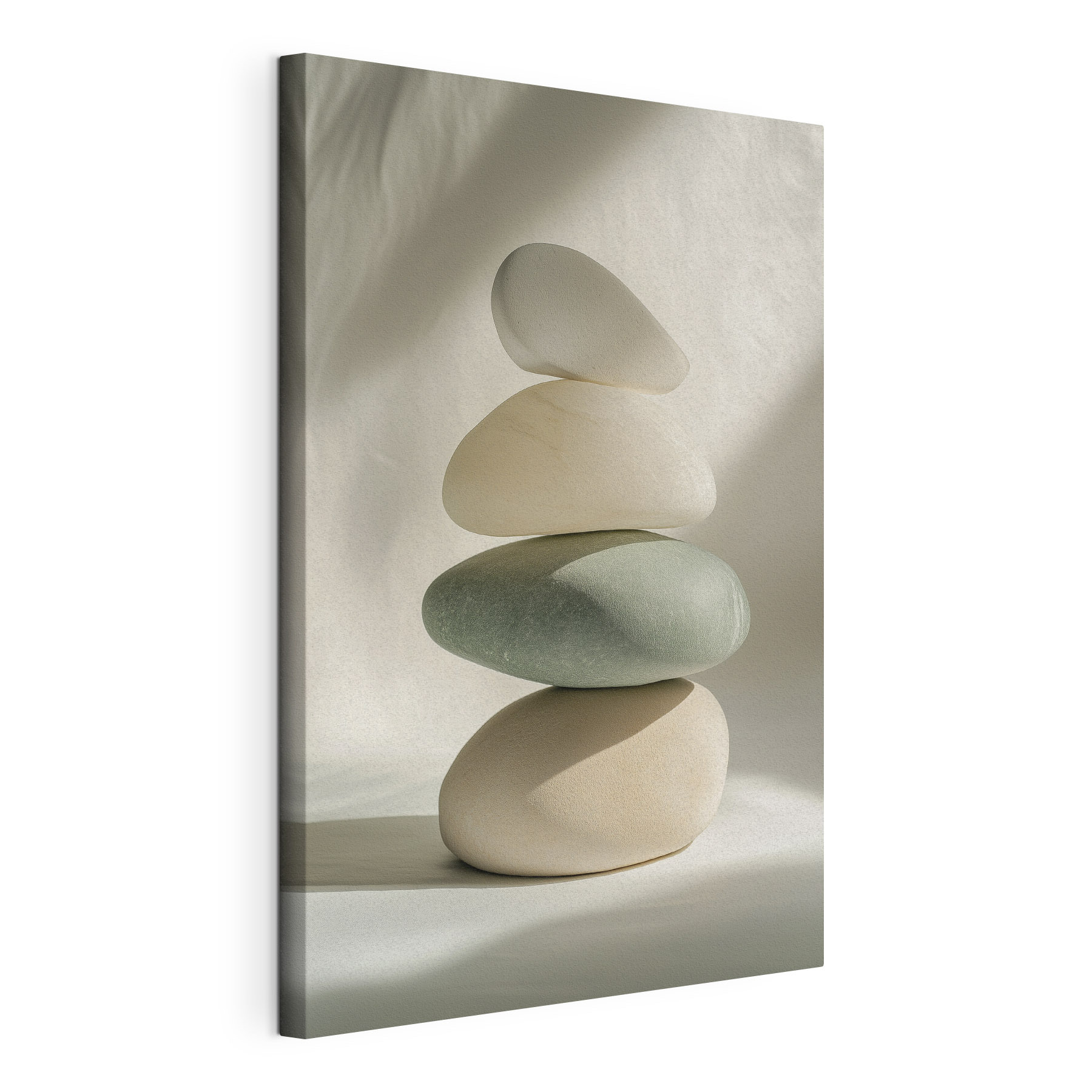 Stack of rocks on a white surface