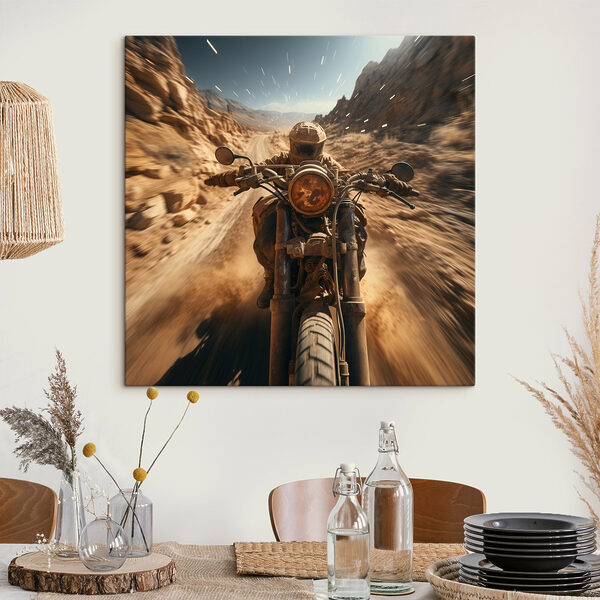 Person riding a motorcycle on a dirt road