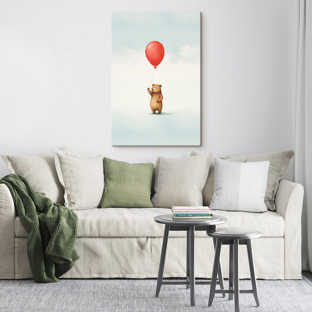 Bear holding a red balloon