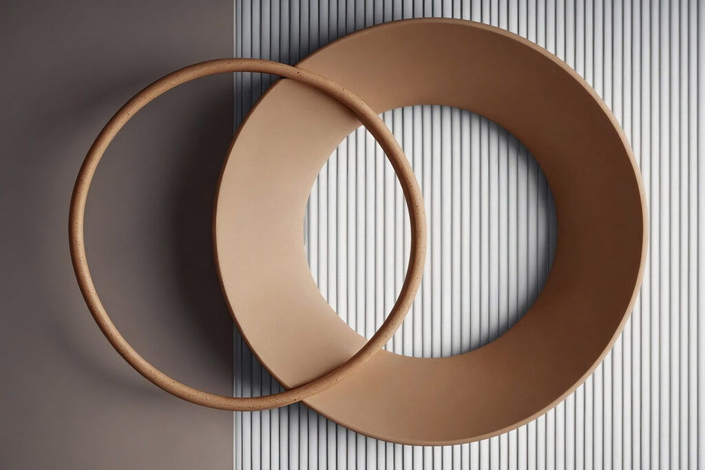 Two circular objects on a wall
