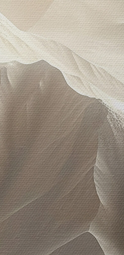White mountain range with many layers of snow