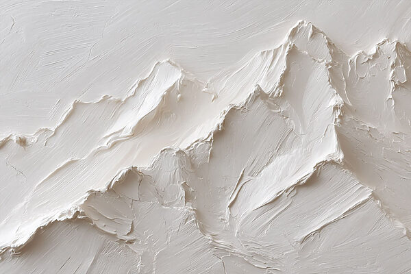 White mountain with a few layers of snow