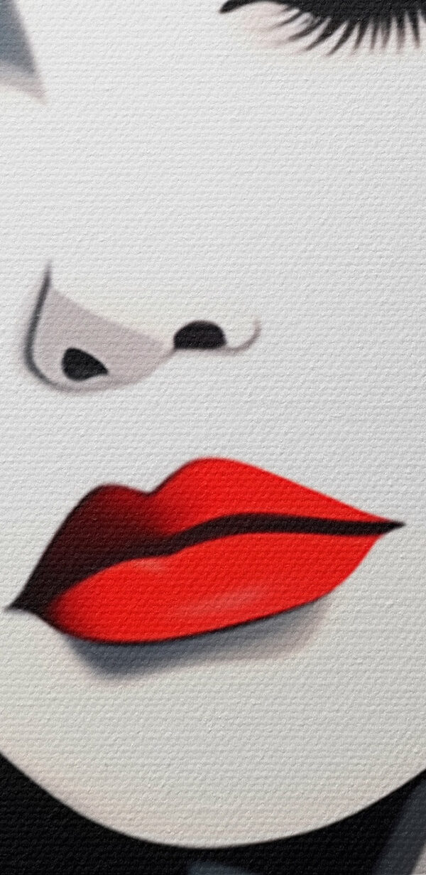 Woman with red lips and black hair