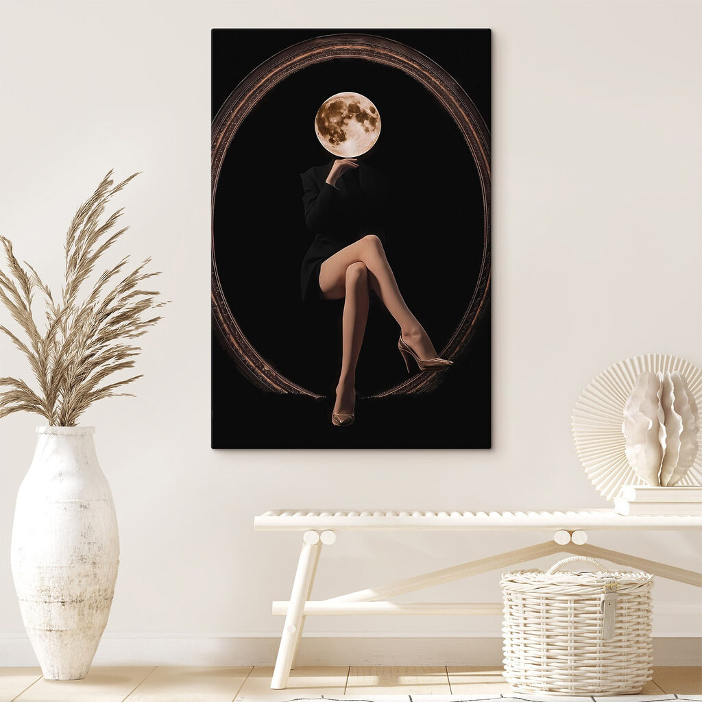 Woman sitting in a chair with a moon in her face