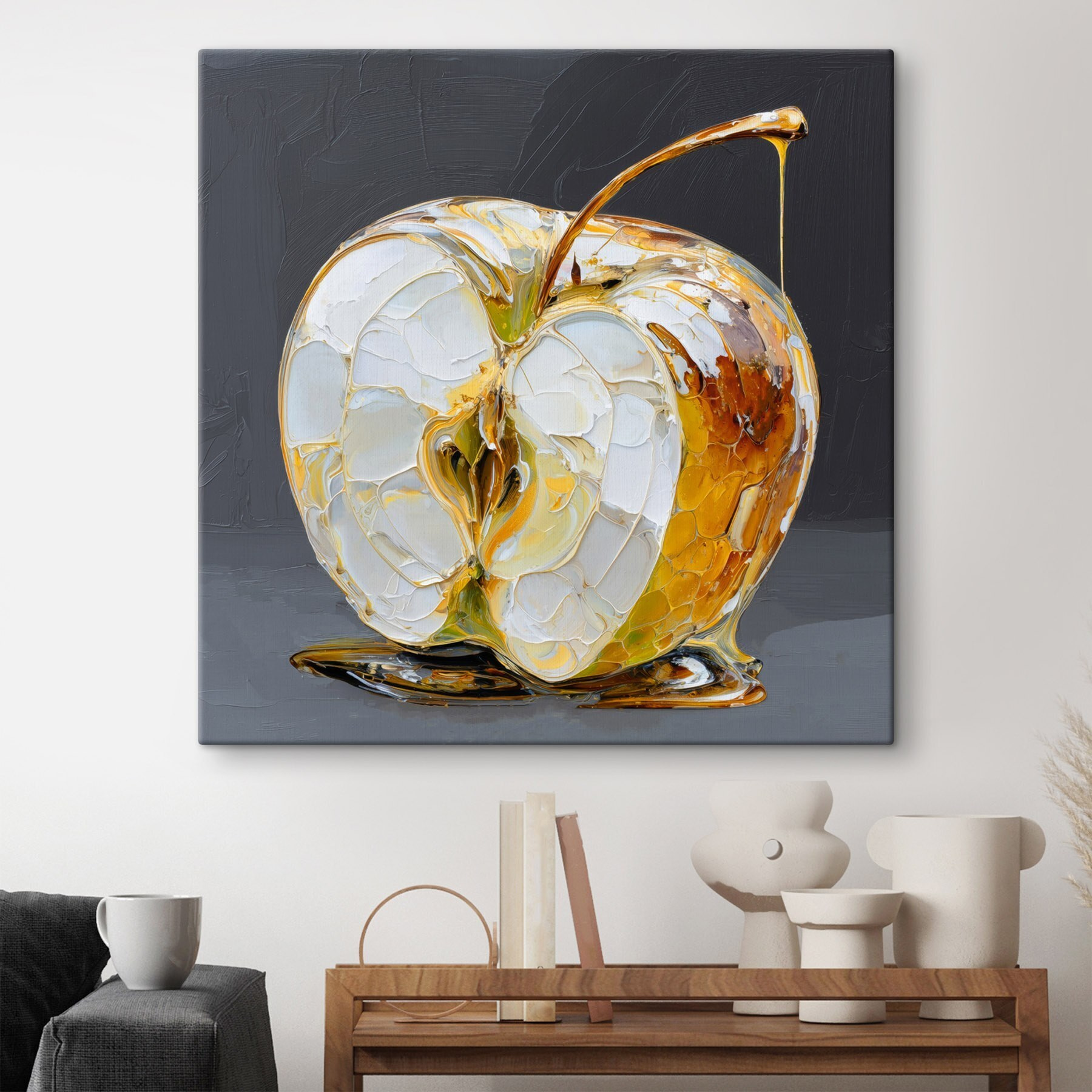 Transparent apple with golden drips