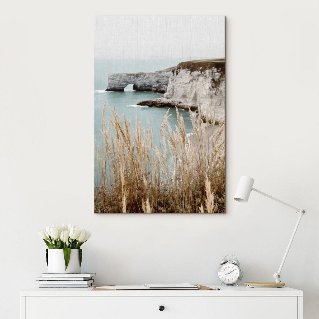 Tall grass next to a body of water Tall grass next to a body of water
