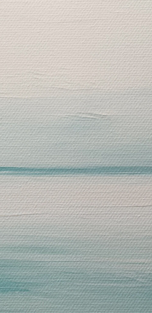 Calm ocean with a cloudy sky
