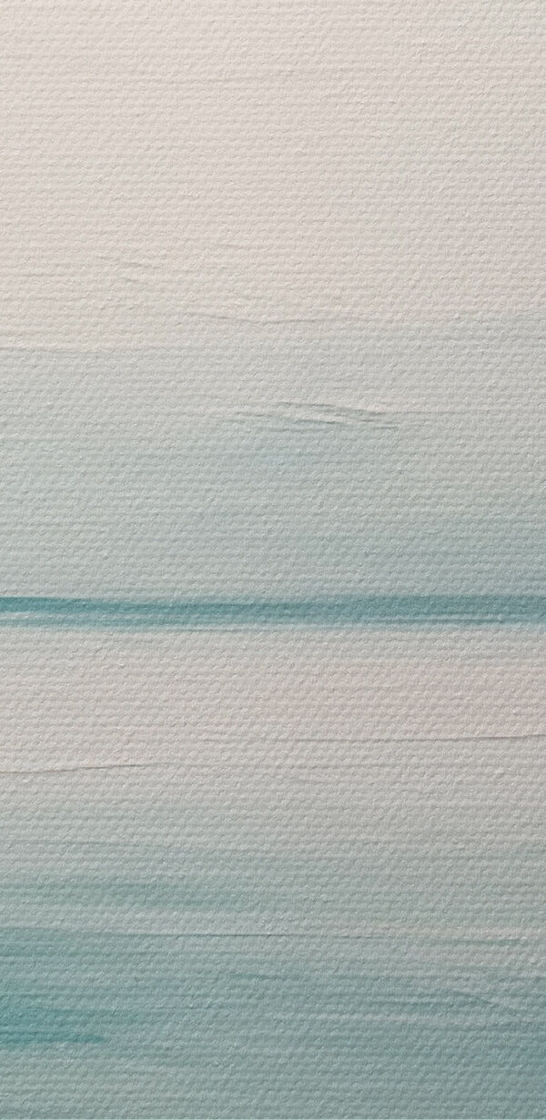 Calm ocean with a cloudy sky