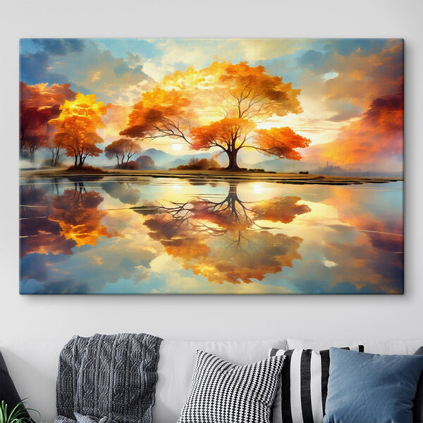 Tree with yellow leaves on the ground and a body of water Tree with yellow leaves on the ground and a body of water