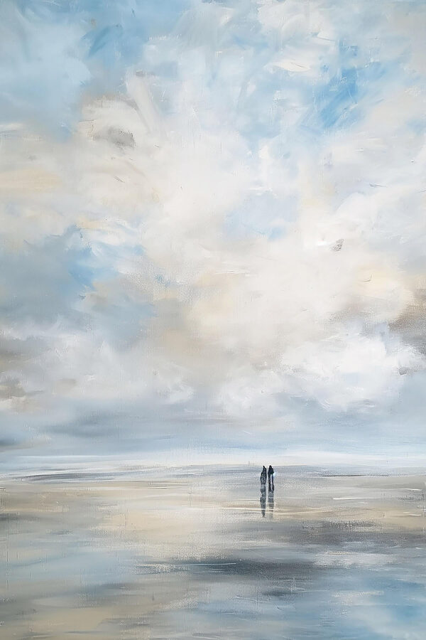 Couple of people standing on a beach