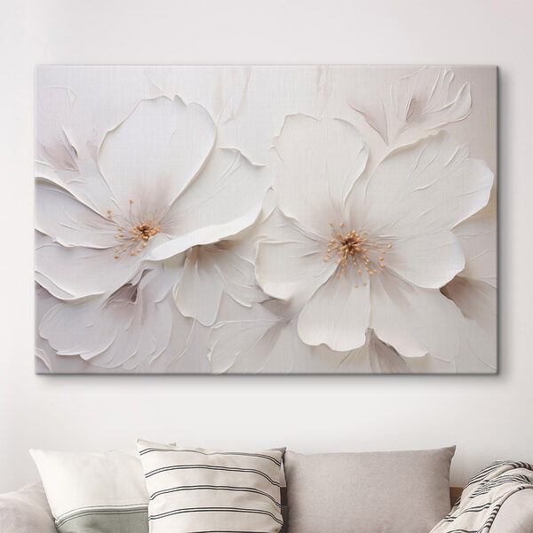White flower art on a wall