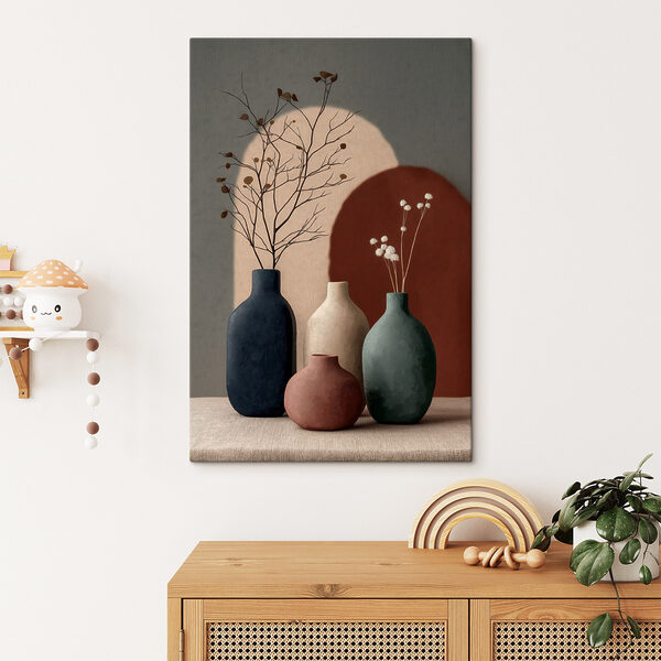 Group of vases with flowers in them