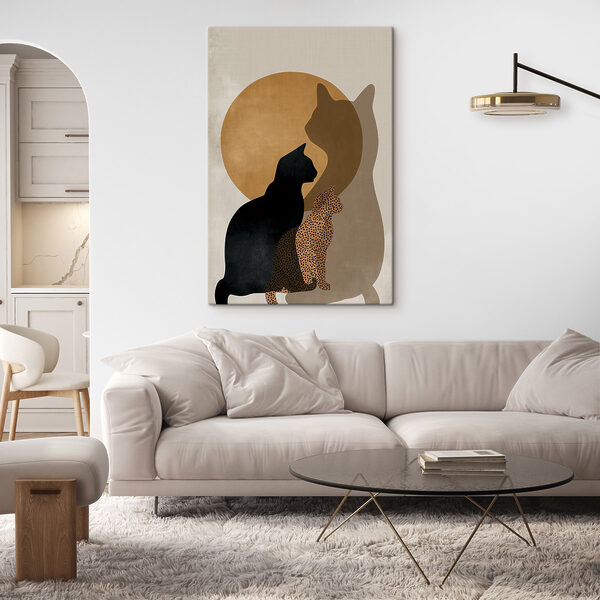 Cat silhouettes in front of a circle