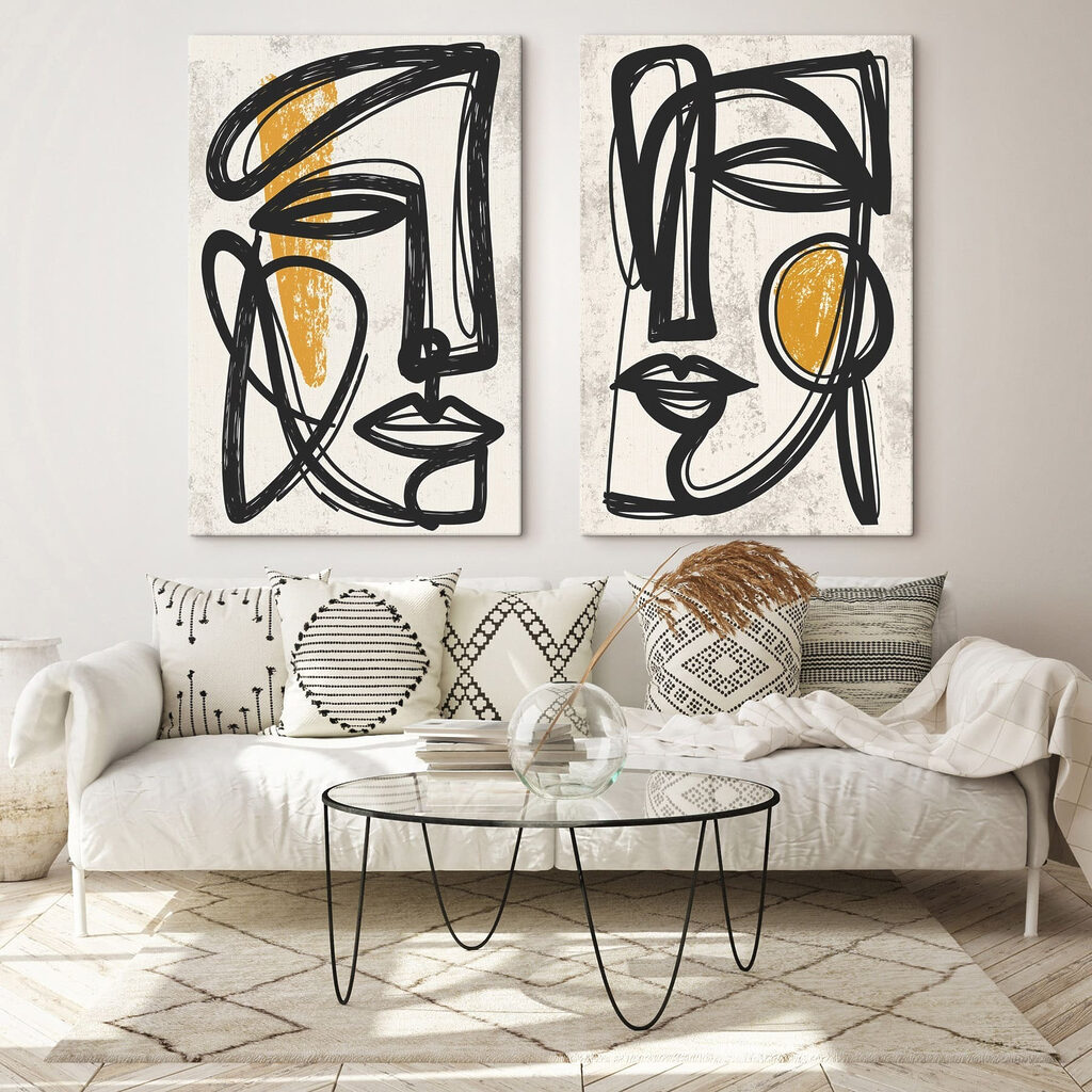 Couple of faces drawn in black and yellow Couple of faces drawn in black and yellow