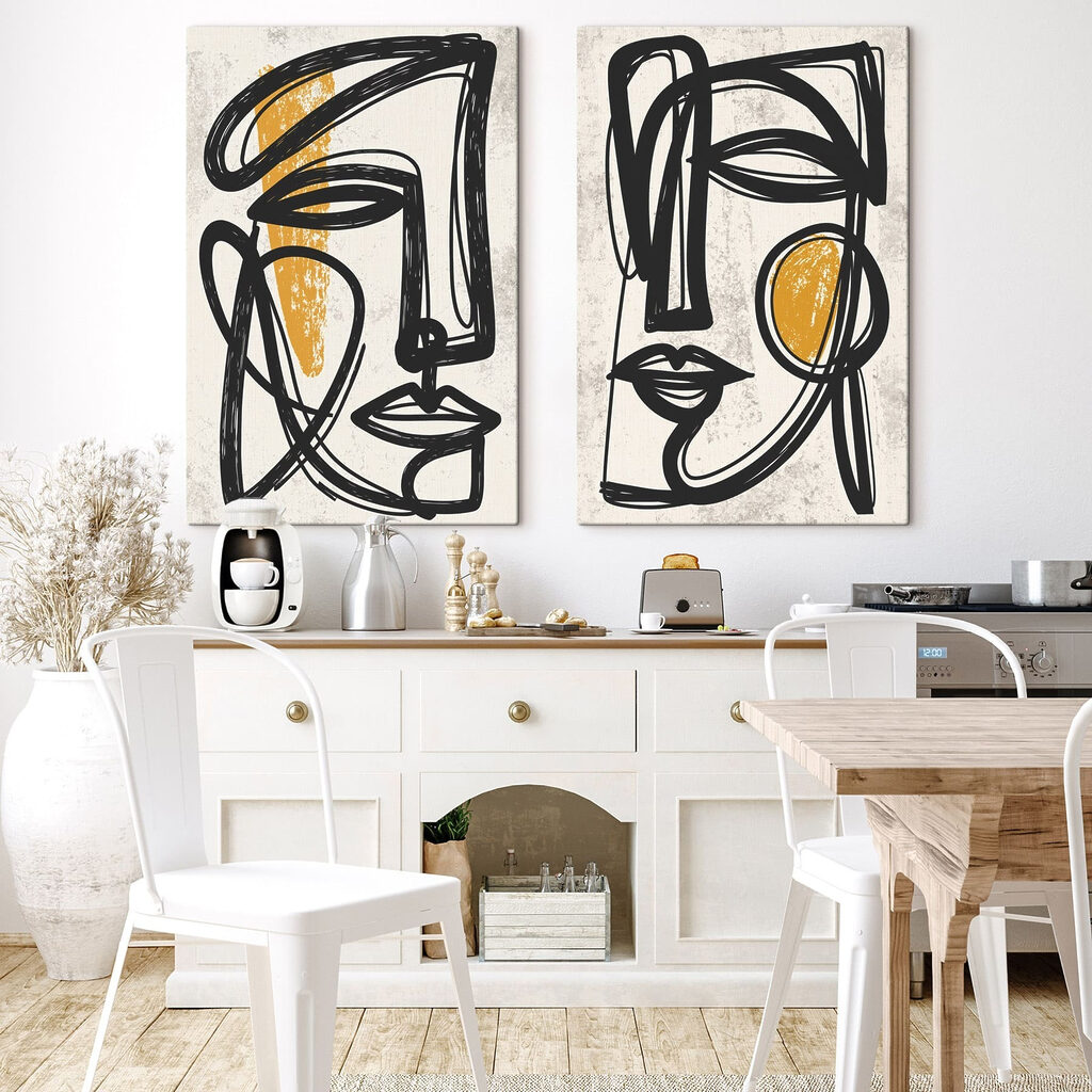 Couple of faces drawn in black and yellow Couple of faces drawn in black and yellow